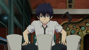 Rin intenta encender las velas
