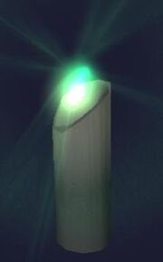 Large black candle (Visible)