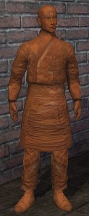 A male terracotta monk (visible)
