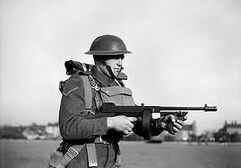 A british soldier with tommy gun