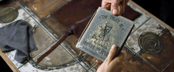 DH1 Scrimgeour passing The Tales of Beedle the Bard book to Hermione Granger