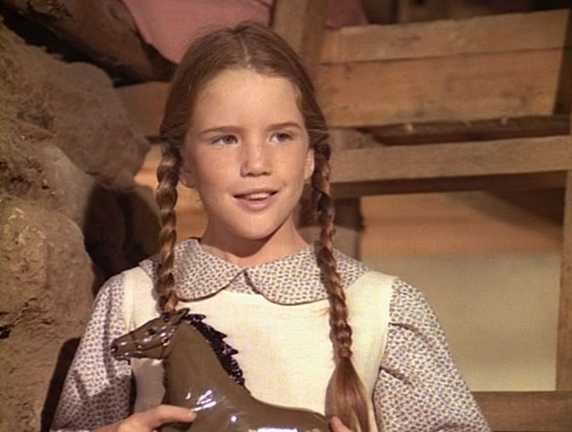 What was Laura Ingalls Wilder's childhood like?