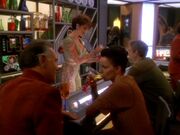 Leeta tends the bar at Quark's