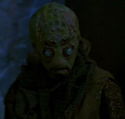 Bug-Eyed Alien Prisoner