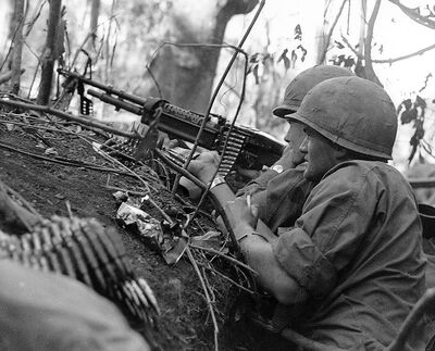 743px-Soldiers Laying Down Covering Fire