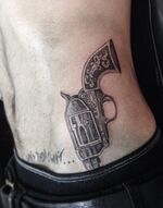 Zayn-malik-gun-tattoo-400x508