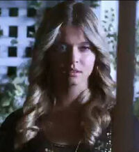 Alison outside the window