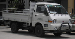 Inokom Lorimas (first generation) (front), Serdang