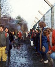 Embracing the base, Greenham Common December 1982 - geograph.org.uk - 759090