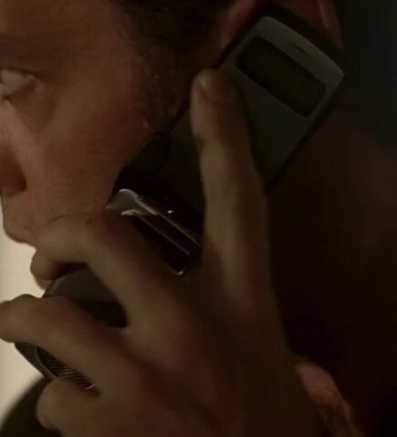 File:5x08 Polakov phone.jpg