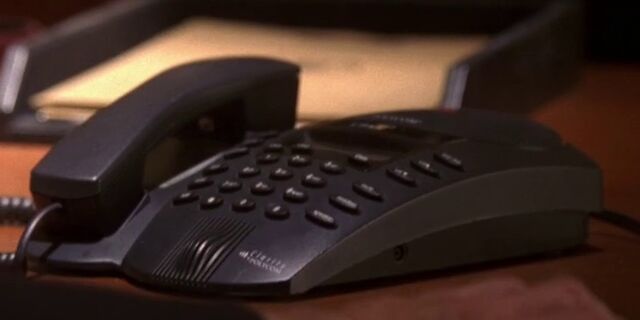File:5x02 Logan phone.jpg