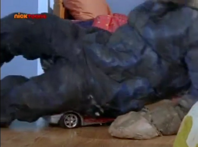 File:MegaMeltmanSmashesTheActionMobile.png