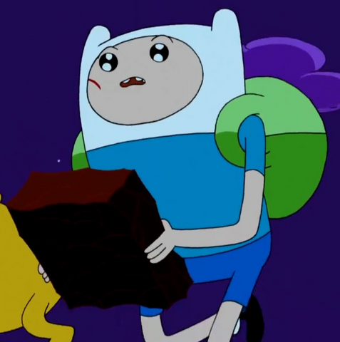 File:S4e26 Finn with Enchiridion.png
