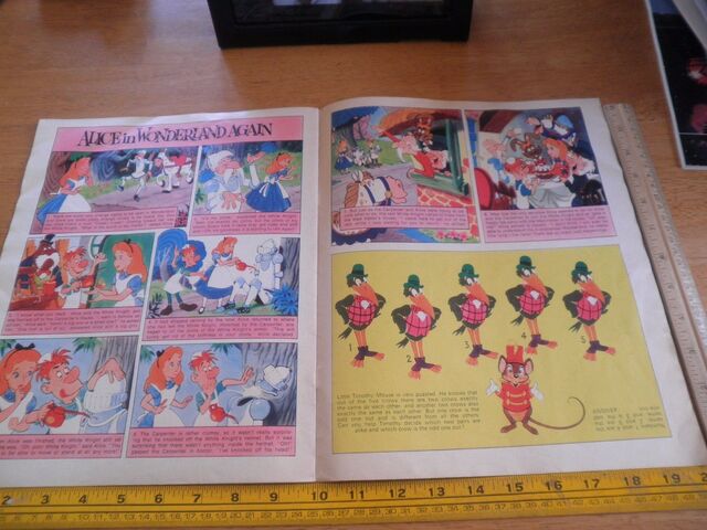 File:Disneyland-Magazine-1974-Alice-in-Wonderland-Clarabelle-wraparound- 57.jpg