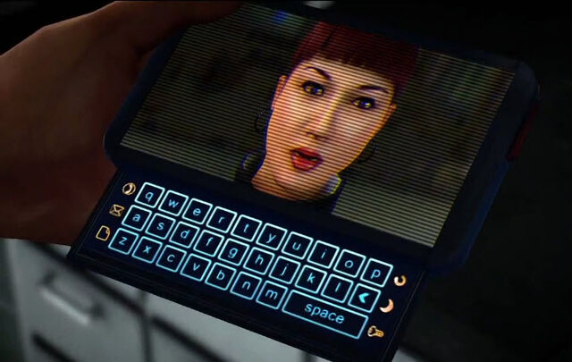 File:Mike finds his PDA.jpg