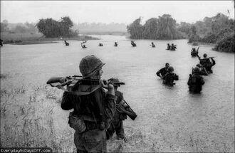 Vietnam-War-Paratroopers-Water-Rain-Rifles