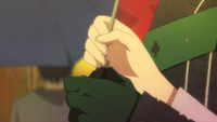 Couple Holding The Umbrella