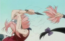 Sakura cutting her hair