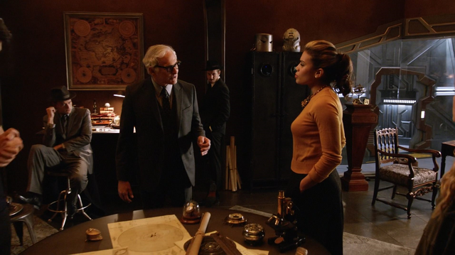 File:Rip Hunter's team in the Waverider's office.png