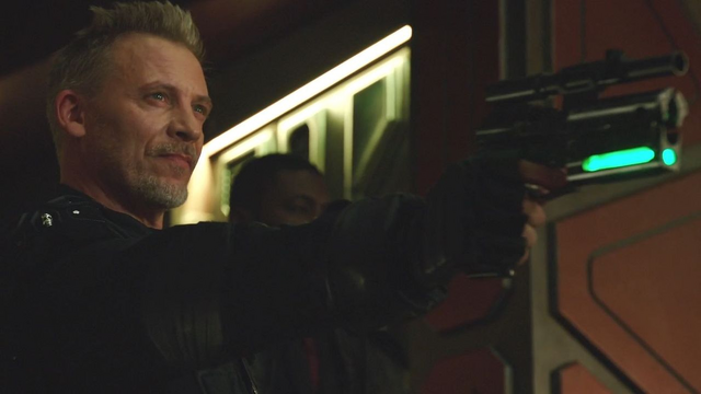 File:John Valor holds Rip Hunter at gunpoint.png