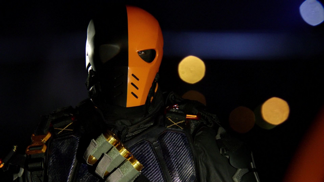 File:Deathstroke hijacks prison bus.png