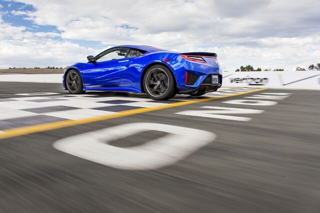 File:2017-acura-nsx-rear-three-quarters-in-motion.jpg