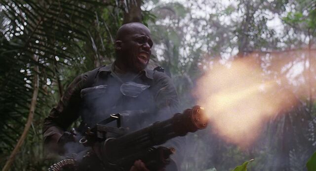 File:Mac fires Minigun.jpg