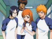 Orihime holding Tatsuki's wristband.jpg