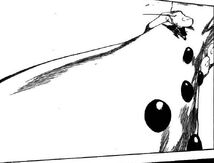 Kenpachi en el brazo de Yammy.jpg