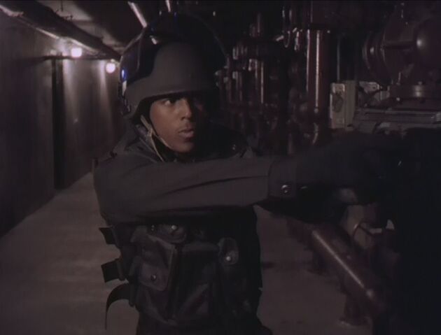 File:2x02-hallway-guard.jpg