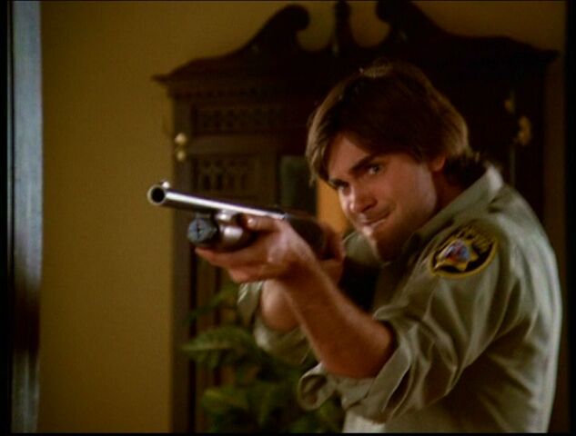 File:6x17-ChrisGun.jpg