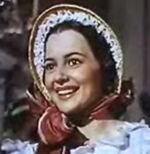 Olivia de Havilland as Melanie Hamilton in Gone With the Wind trailer cropped.jpg
