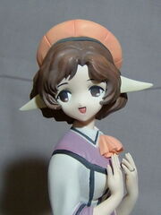 Yumi figurine