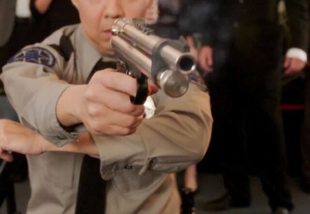 File:Chang's tranquilizer gun.jpg