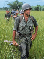 553909us-army-captain-robert-bacon-leading-a-patrol-during-the-early-years-of-the-vietnam-war-posters