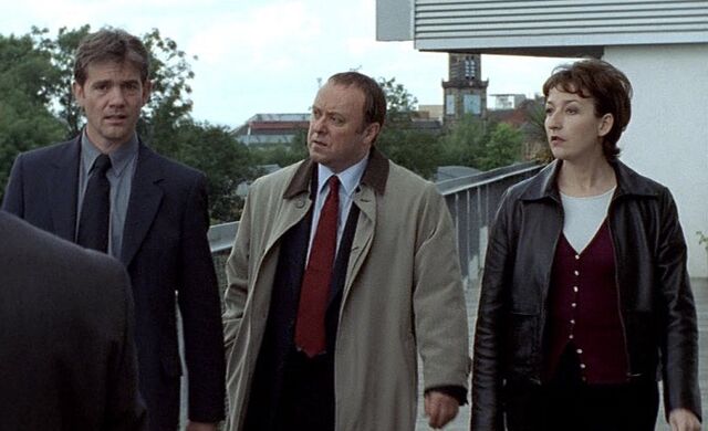 File:The team when Stuart gets the call from Langbank in Death Trap.jpg