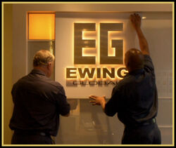 Ewing Global sign