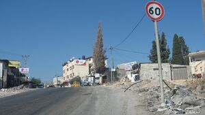 Zoldan Monument Right to entrance to Al Funduq.jpg