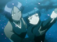 Yoruichi teaches one of her students how to use a Zanpakuto