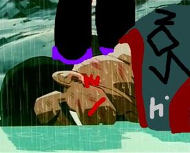 Mickey stands over jacon's dead body