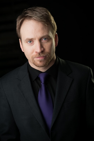 File:Trevor Devall.png