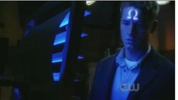 Oliver-queen-omega-symbol-branded-on-forehead