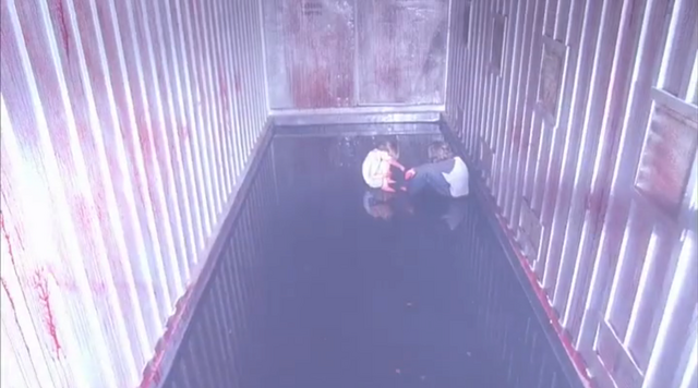 File:DexterAndBrianInTheShippingContainer.png