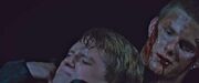 618px-Cato strangling Peeta (2)