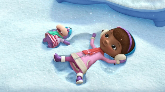 File:Doc and hallie making snow angels.jpg