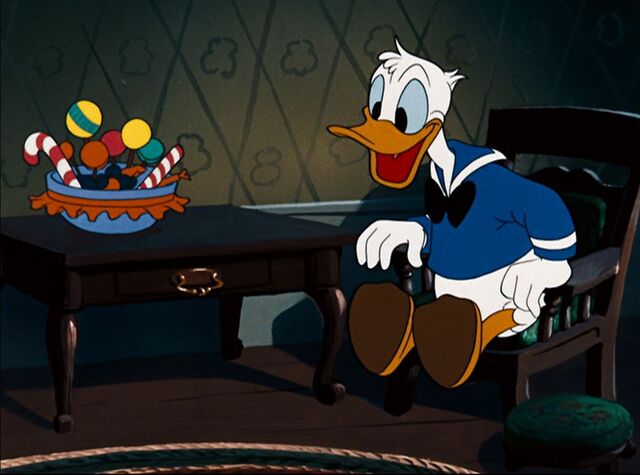 File:Donald Duck with candy.jpg