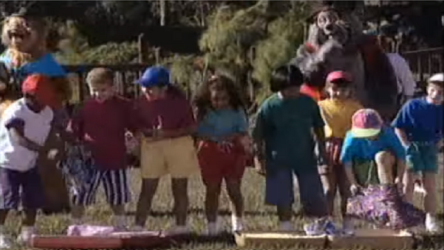 File:Kids during picnic games.png