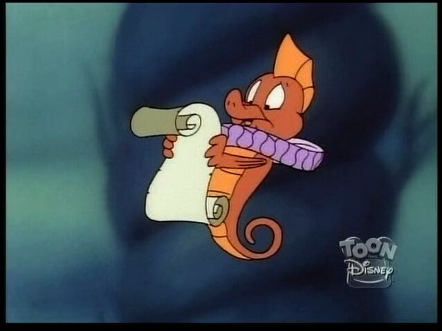 File:The Seahorse Herald reading the paper.jpg