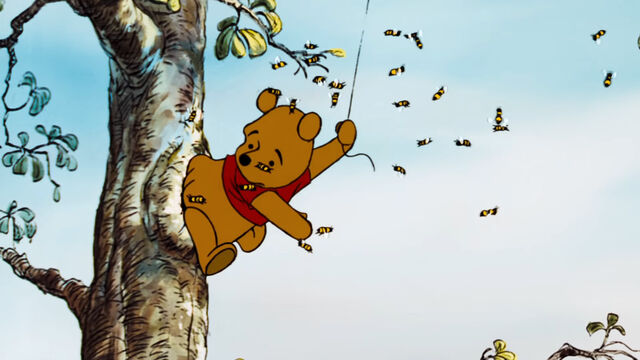 File:Winnie the Pooh got his bottom stuck in the honey tree.jpg