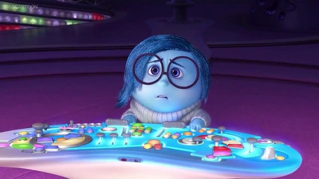 File:Sadness at the controls.png